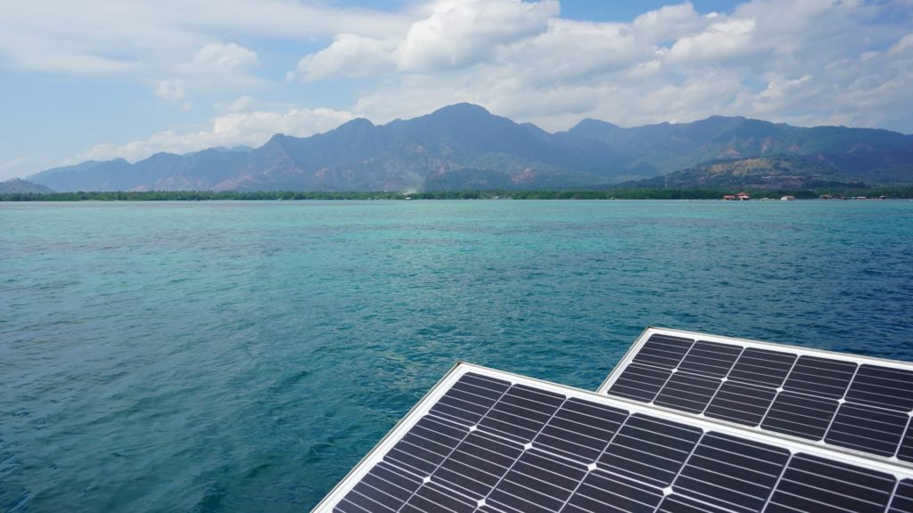 Solar panels installed near the coast to power an island property